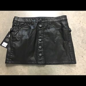Rock & Republic Black leather look mini skirt.